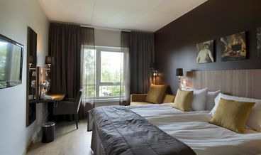 bilde på Standard Triple Room-1 Double Bed and 1 Twin Trundle Bed Free WiFi Free self parking Free breakfast