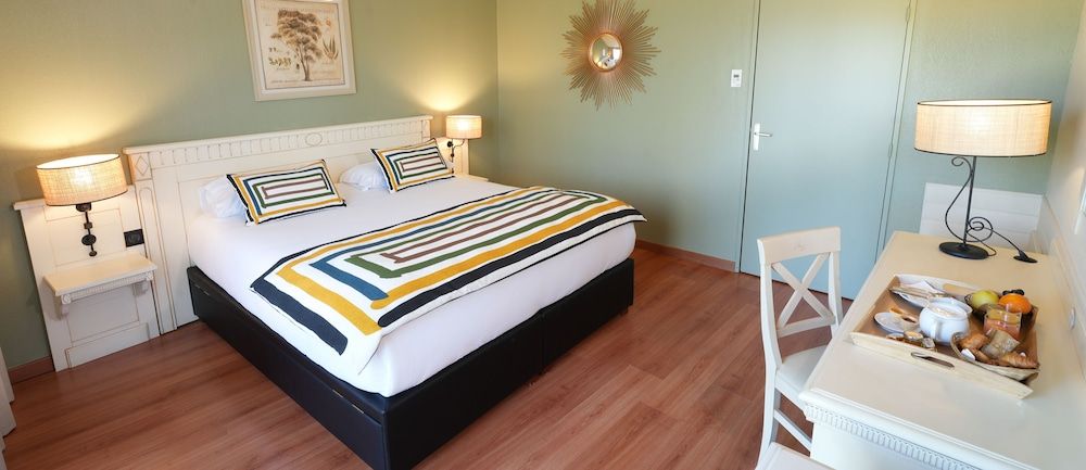 bilde på Dobbelt- eller tomannsrom – deluxe, terrasse, hageutsikt